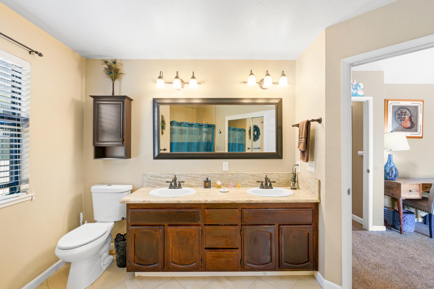 116 Fern Court Galt, CA 95632 - Photo 30 of 44 a bathroom with a sink vanity and mirror
