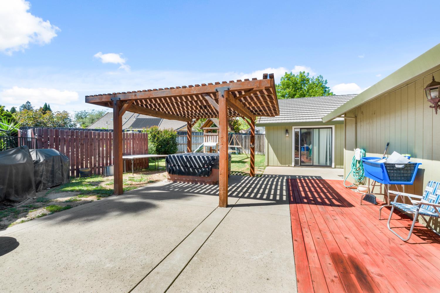 116 Fern Court Galt, CA 95632 - Photo 36 of 44 a view of a patio with a table and chairs