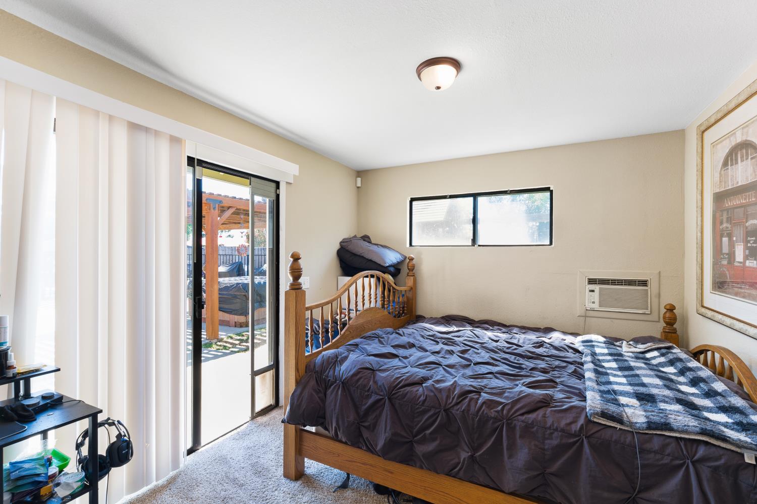 116 Fern Court Galt, CA 95632 - Photo 42 of 44 a bedroom with a bed and a window
