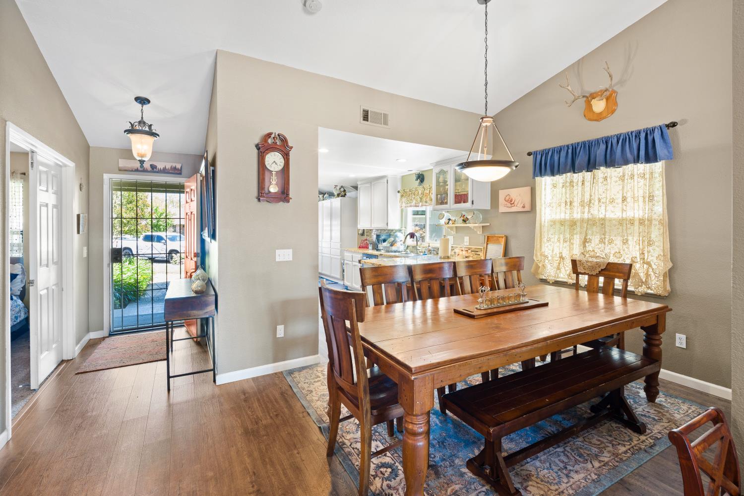 116 Fern Court Galt, CA 95632 - Photo 10 of 44 a dining room with furniture and wooden floor