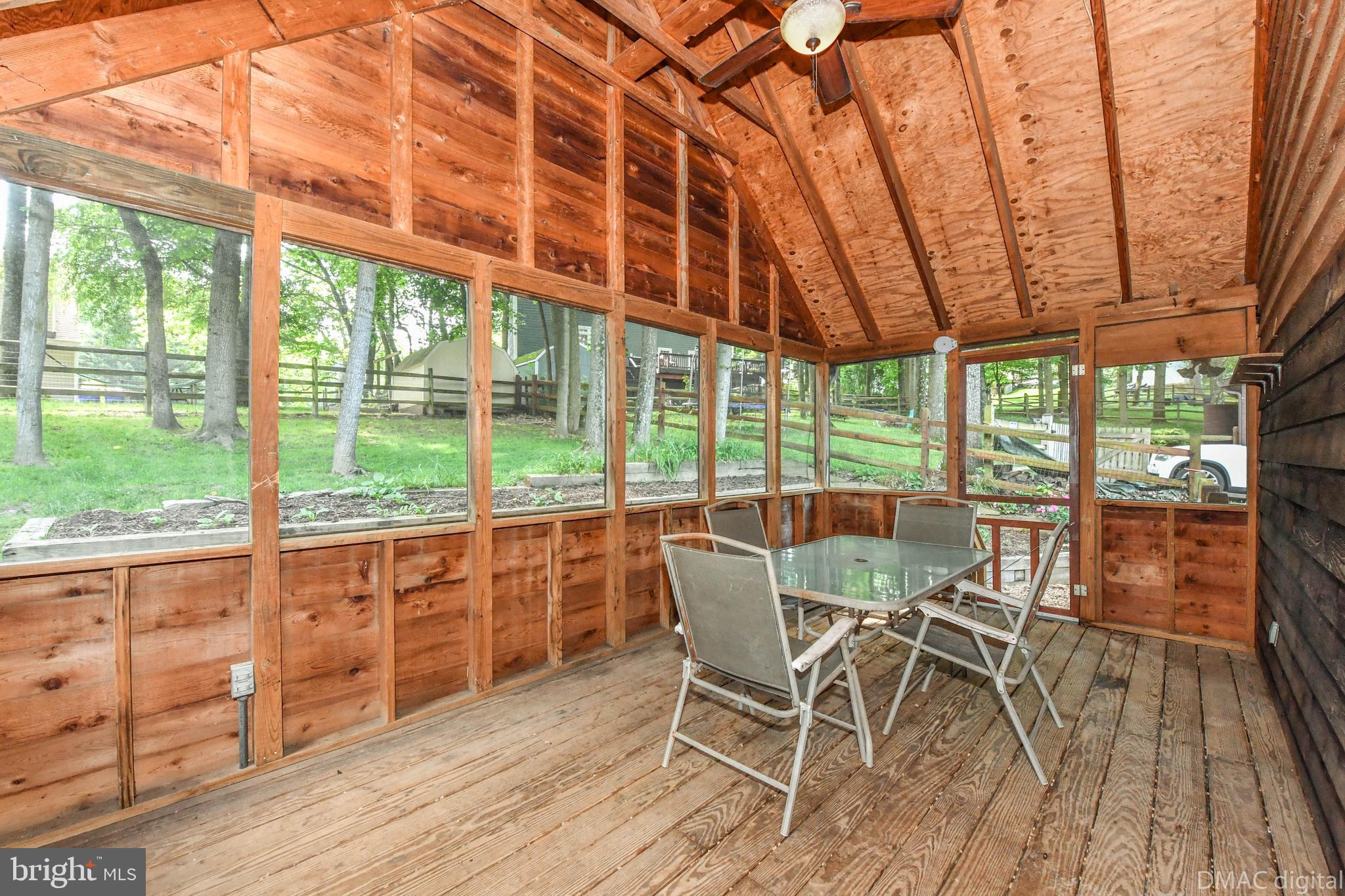 6607 Rockridge Road New Market, MD 21774 - Photo 32 of 52 Screened-in porch opens to fully fenced yard.