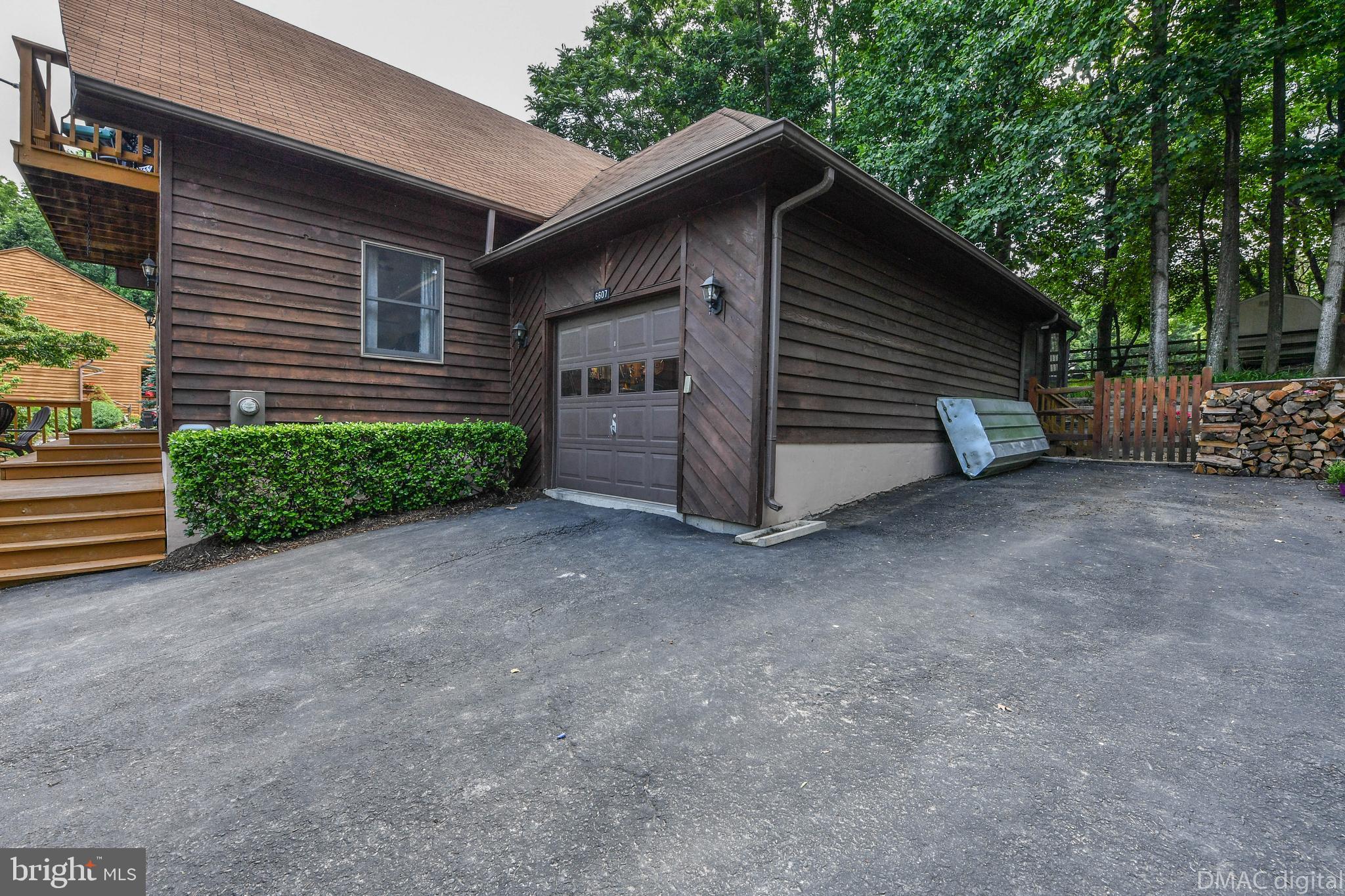 6607 Rockridge Road New Market, MD 21774 - Photo 44 of 52 Attached garage and plenty of parking in driveway.