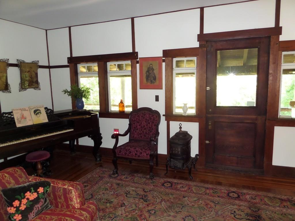 9 Bell Road Middlefield, MA 01243 - Photo 13 of 18 a living room with furniture a window and a table