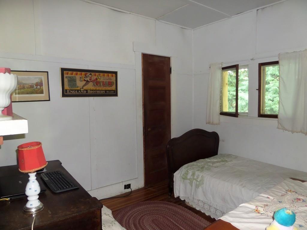 9 Bell Road Middlefield, MA 01243 - Photo 14 of 18 a bedroom with a bed and wooden floor