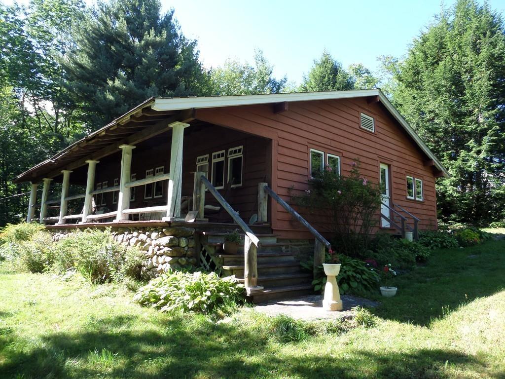 9 Bell Road Middlefield, MA 01243 - Photo 3 of 18 a house with trees in the background