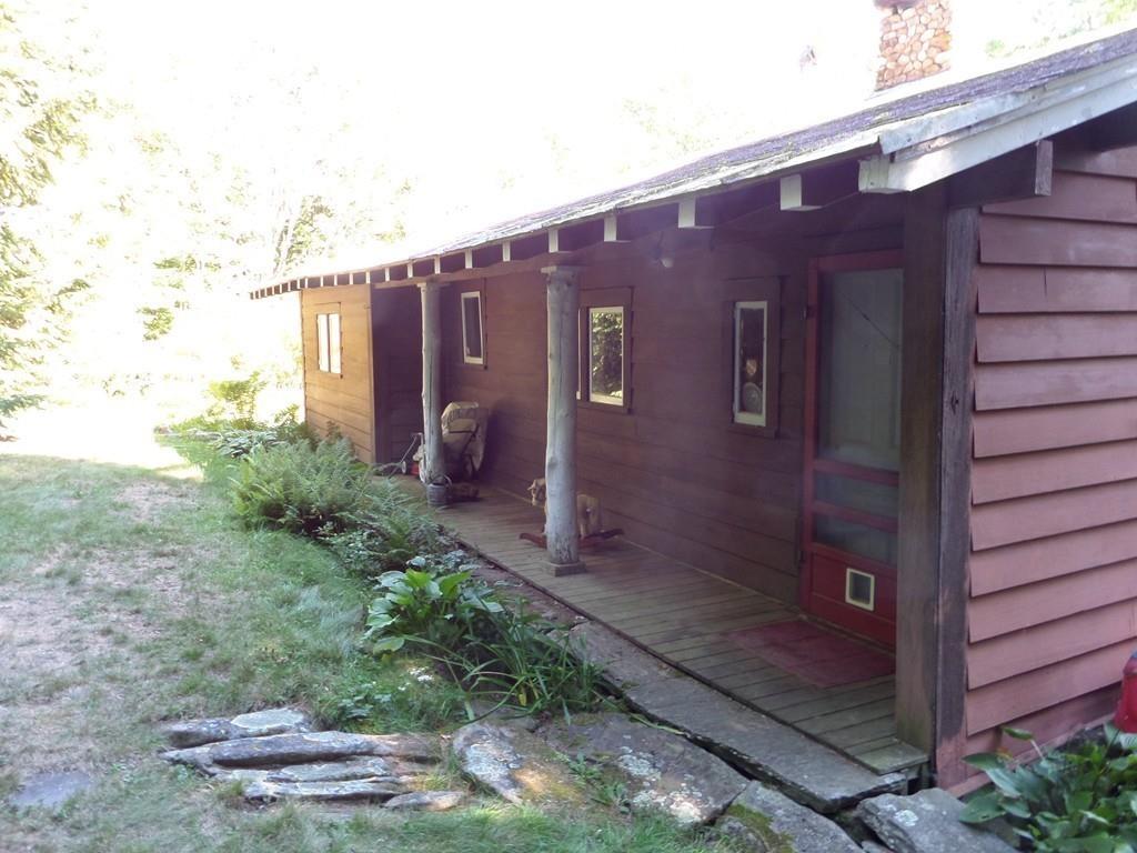 9 Bell Road Middlefield, MA 01243 - Photo 8 of 18 a view of a back yard of the house