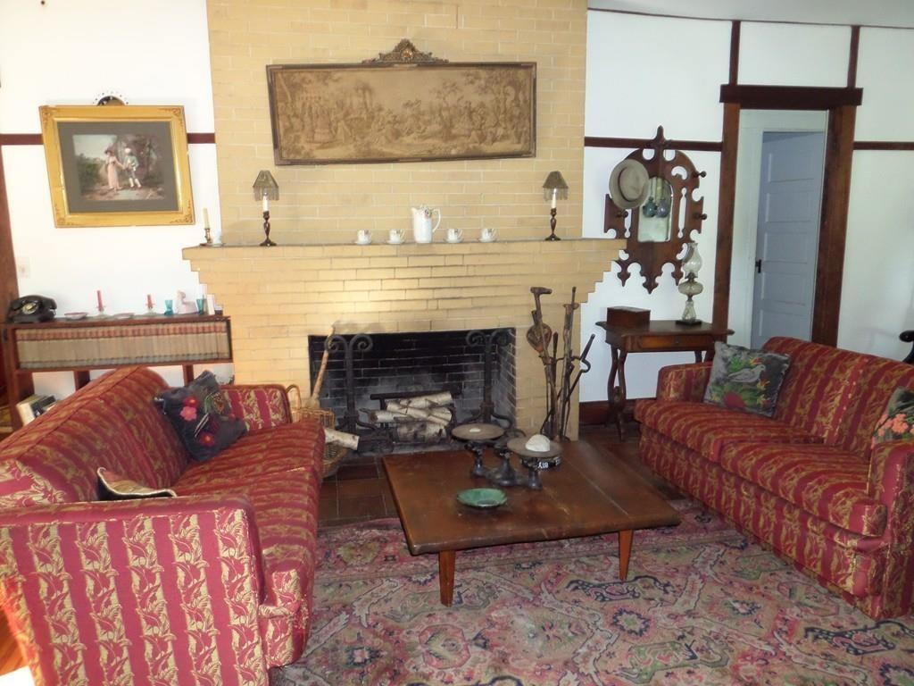 9 Bell Road Middlefield, MA 01243 - Photo 10 of 18 a living room with furniture and a fireplace
