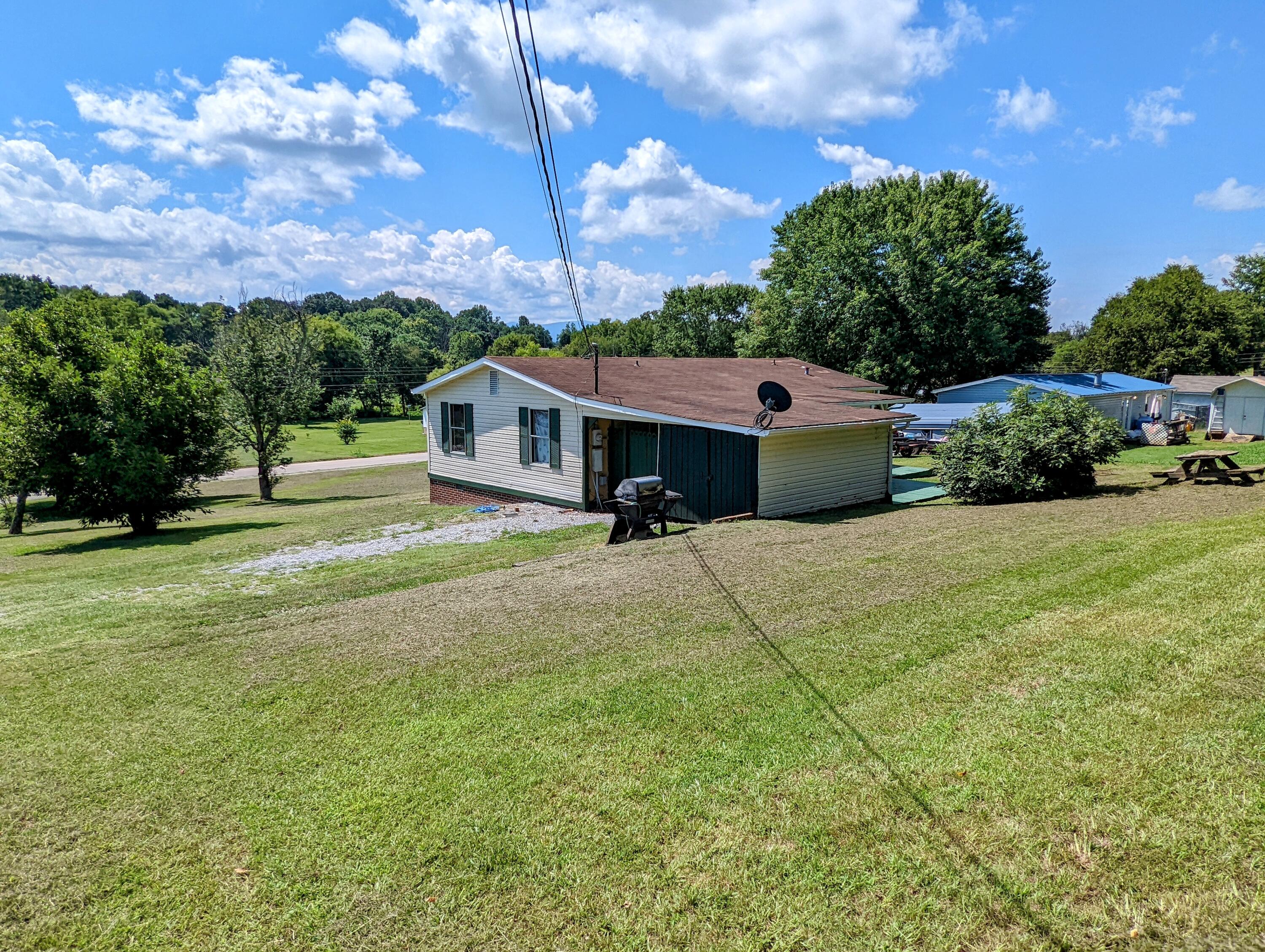 135 Beech Grove Road Telford, TN 37690 - Photo 9 of 33 Rear of home
