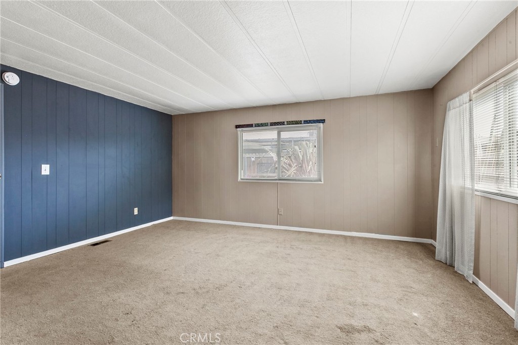 519 West Taylor Street, Unit 252 Santa Maria, CA 93458 - Photo 13 of 52 an empty room with windows