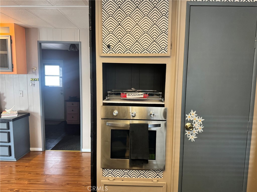 519 West Taylor Street, Unit 252 Santa Maria, CA 93458 - Photo 21 of 52 a kitchen view of a livingroom and a fireplace