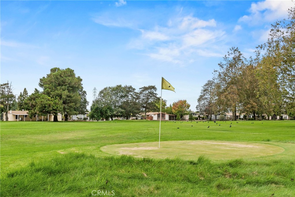 519 West Taylor Street, Unit 252 Santa Maria, CA 93458 - Photo 34 of 52 a view of a park and trees in the background