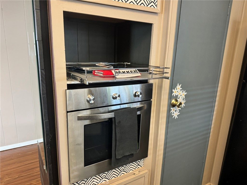 519 West Taylor Street, Unit 252 Santa Maria, CA 93458 - Photo 51 of 52 New Photo taken 1/5/26 - Regular oven with convection, broil & rotisserie functions added end of 2025. Drawers under oven converted to cabinet type storage.