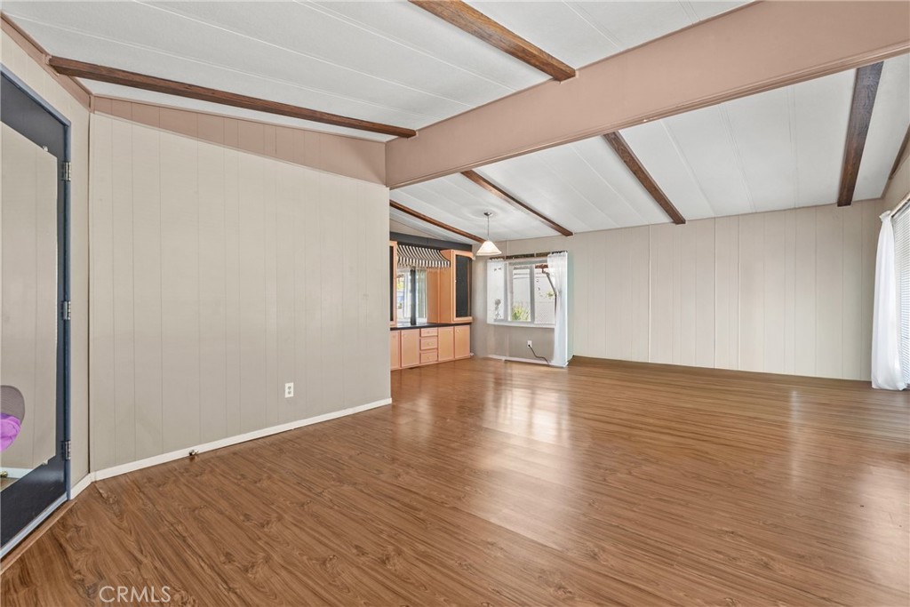 519 West Taylor Street, Unit 252 Santa Maria, CA 93458 - Photo 8 of 52 a view of a room with wooden floor and natural light