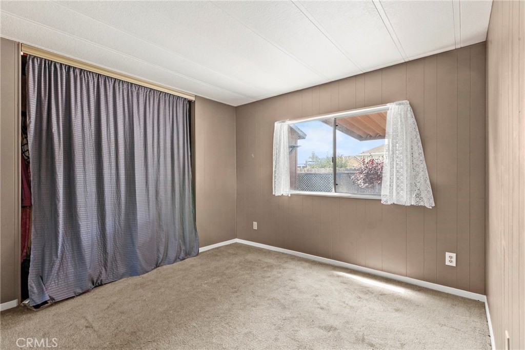 519 West Taylor Street, Unit 252 Santa Maria, CA 93458 - Photo 10 of 52 a view of an empty room with a window