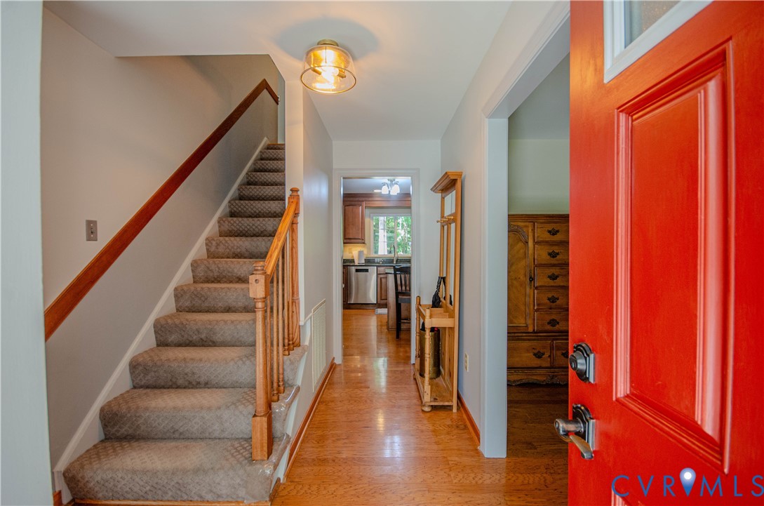 12500 Musical Lane Midlothian, VA 23113 - Photo 4 of 51 Entryway featuring a vibrant red paneled door with