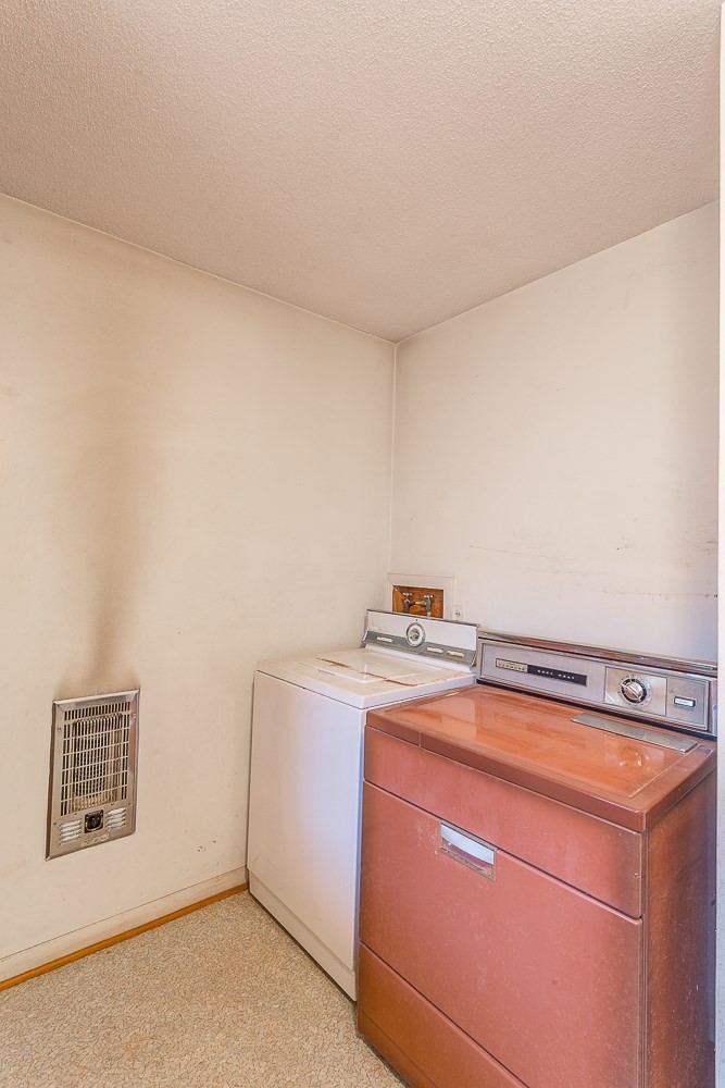 0 Tibbs Bridge Road Southeast Dalton, GA 30721 - Photo 10 of 22 a utility room with dryer and washer