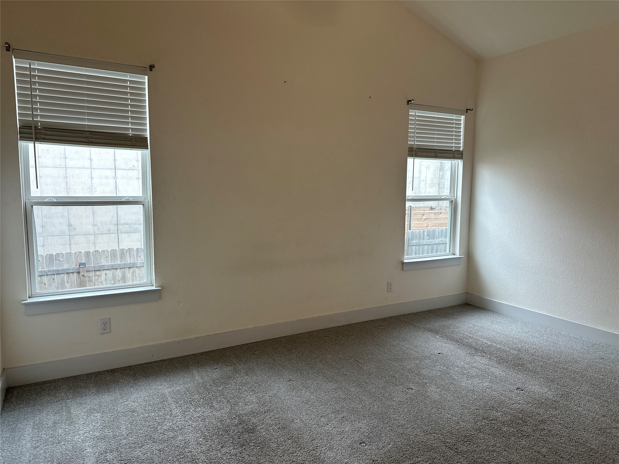 11204 Charger Way Manor, TX 78653 - Photo 11 of 21 an empty room with a window