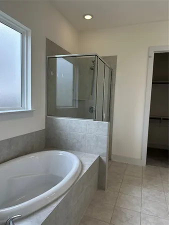 a bathroom with a double vanity sink and mirror
