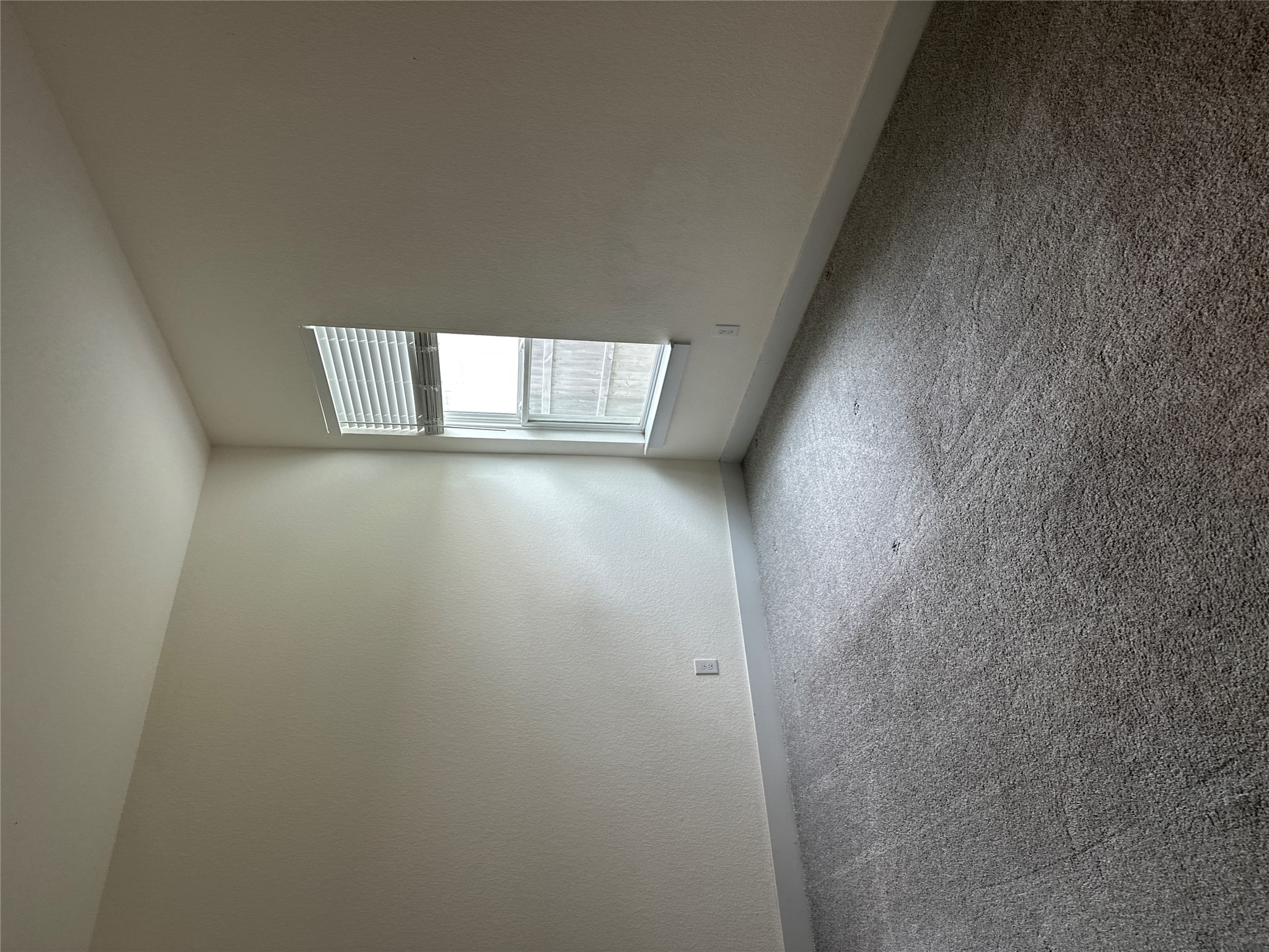 11204 Charger Way Manor, TX 78653 - Photo 17 of 21 an empty room with a window