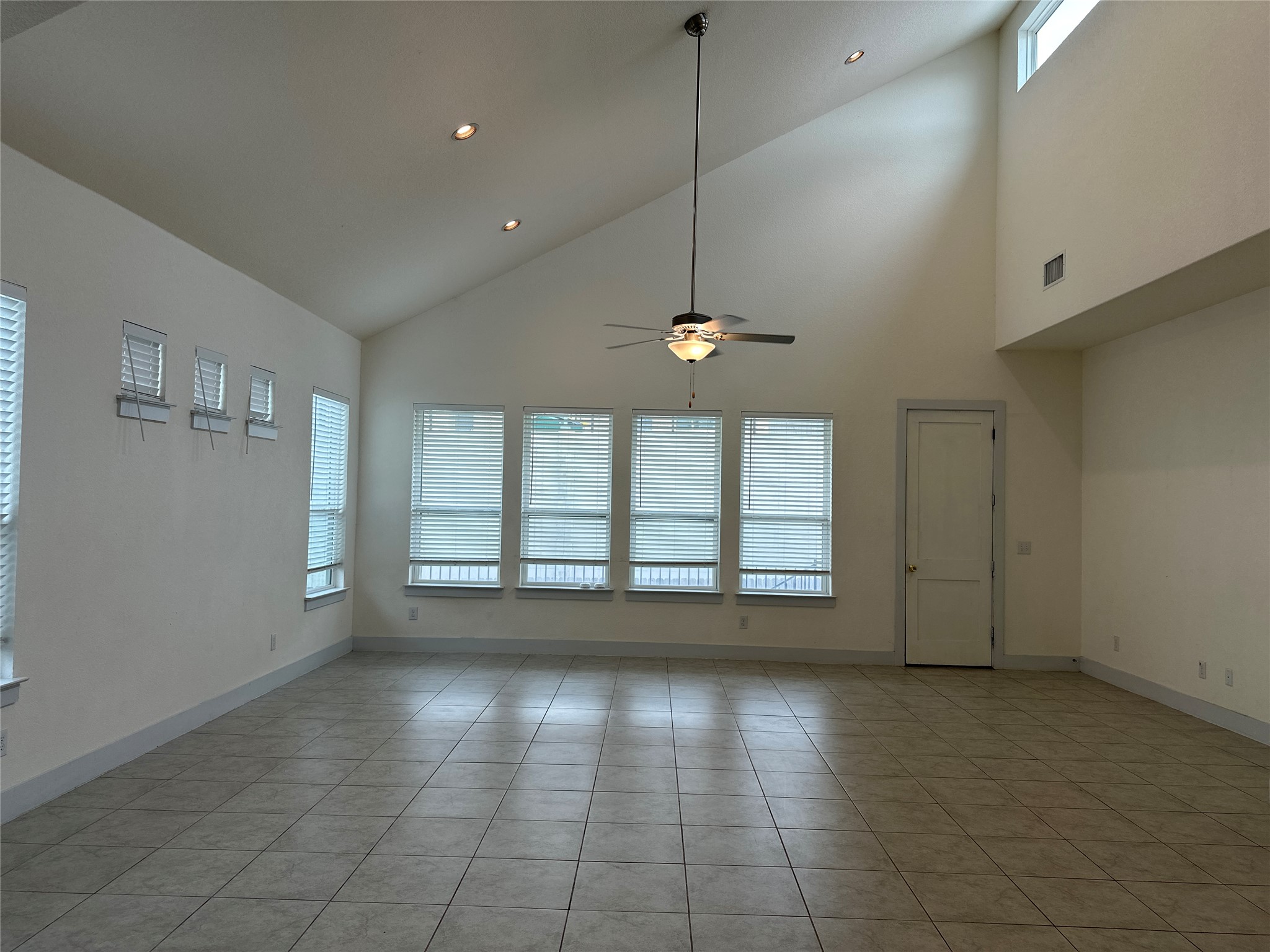 11204 Charger Way Manor, TX 78653 - Photo 5 of 21 a view of an empty room with a window