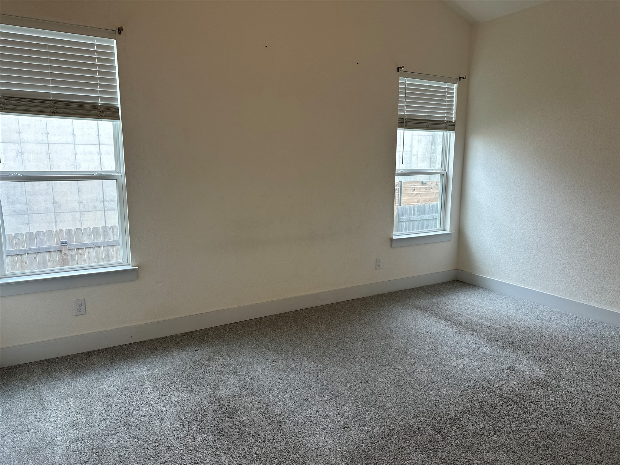 11204 Charger Way Manor, TX 78653 - Photo 10 of 21 an empty room with a window