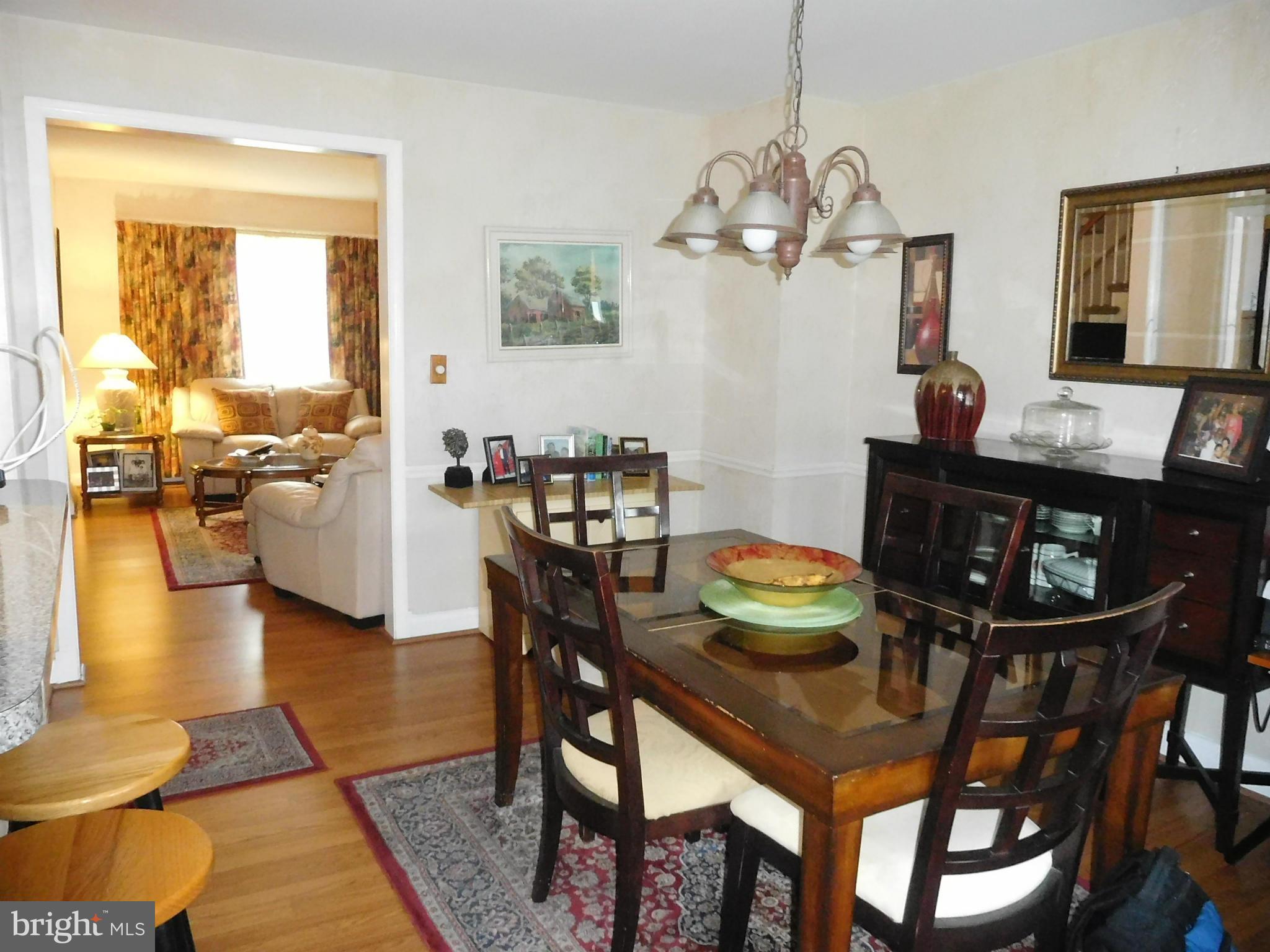 1651 Northbourne Road Baltimore, MD 21239 - Photo 17 of 30 a view of a dining room with furniture and wooden floor