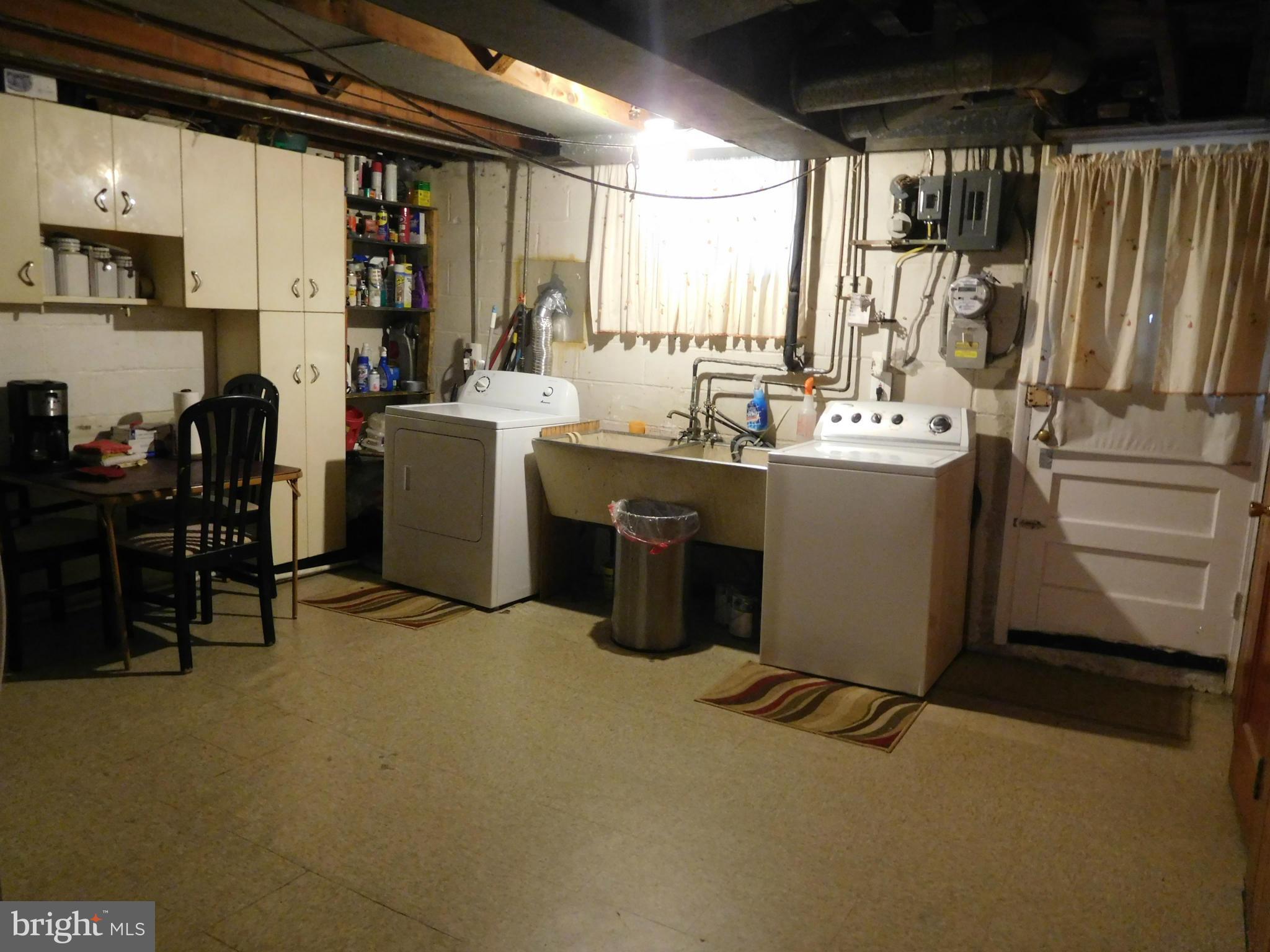 1651 Northbourne Road Baltimore, MD 21239 - Photo 26 of 30 a room with storage and utility
