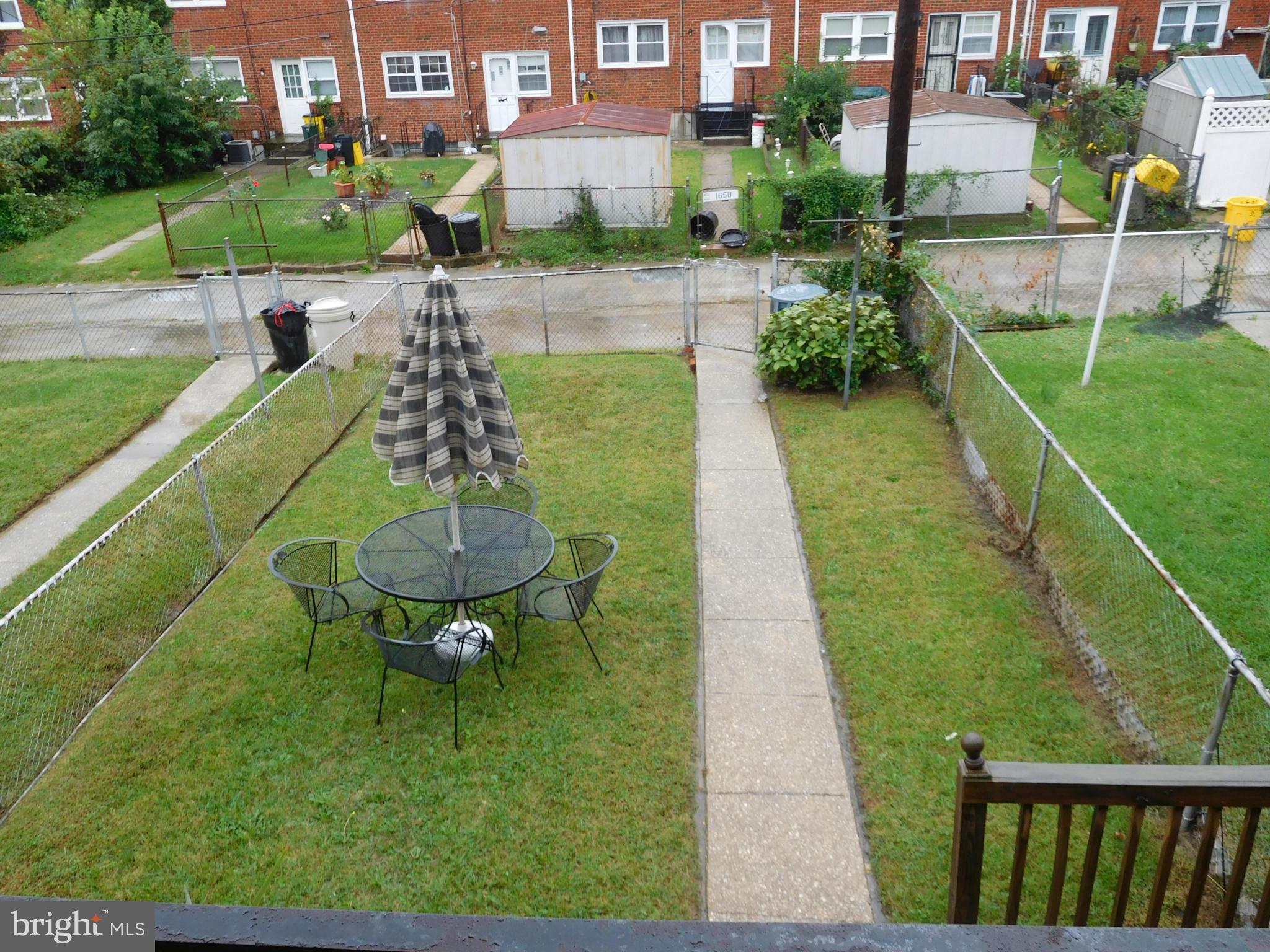 1651 Northbourne Road Baltimore, MD 21239 - Photo 29 of 30 a view of a chairs in backyard of the house
