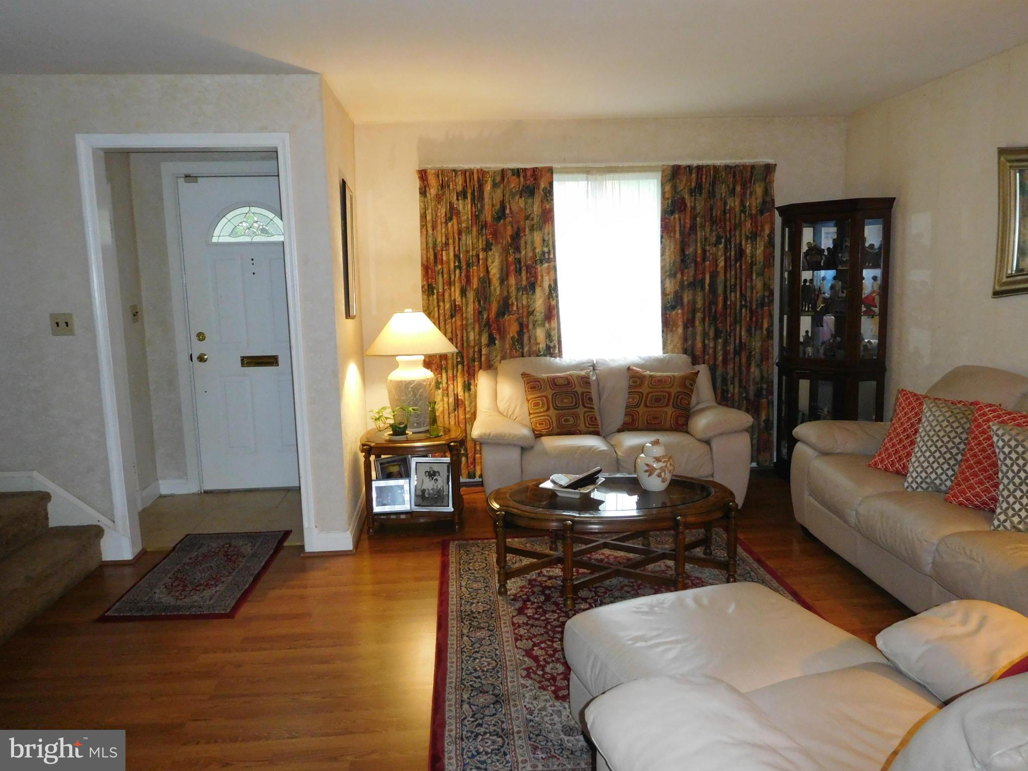 1651 Northbourne Road Baltimore, MD 21239 - Photo 5 of 30 a living room with furniture and a window