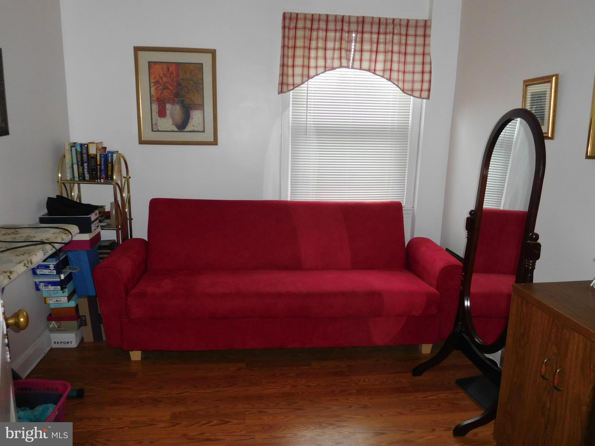 1651 Northbourne Road Baltimore, MD 21239 - Photo 7 of 30 a living room with furniture