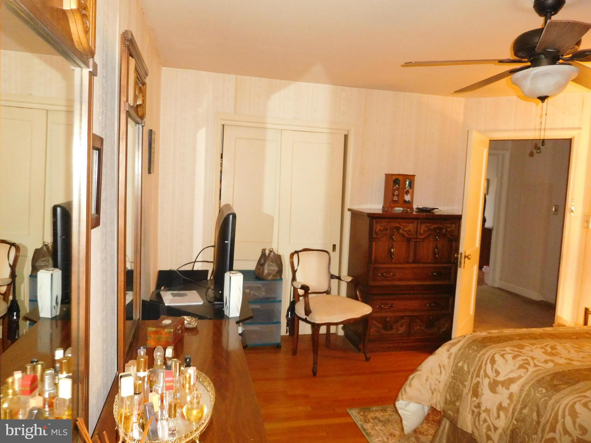 1651 Northbourne Road Baltimore, MD 21239 - Photo 10 of 30 a living room with furniture and a flat screen tv