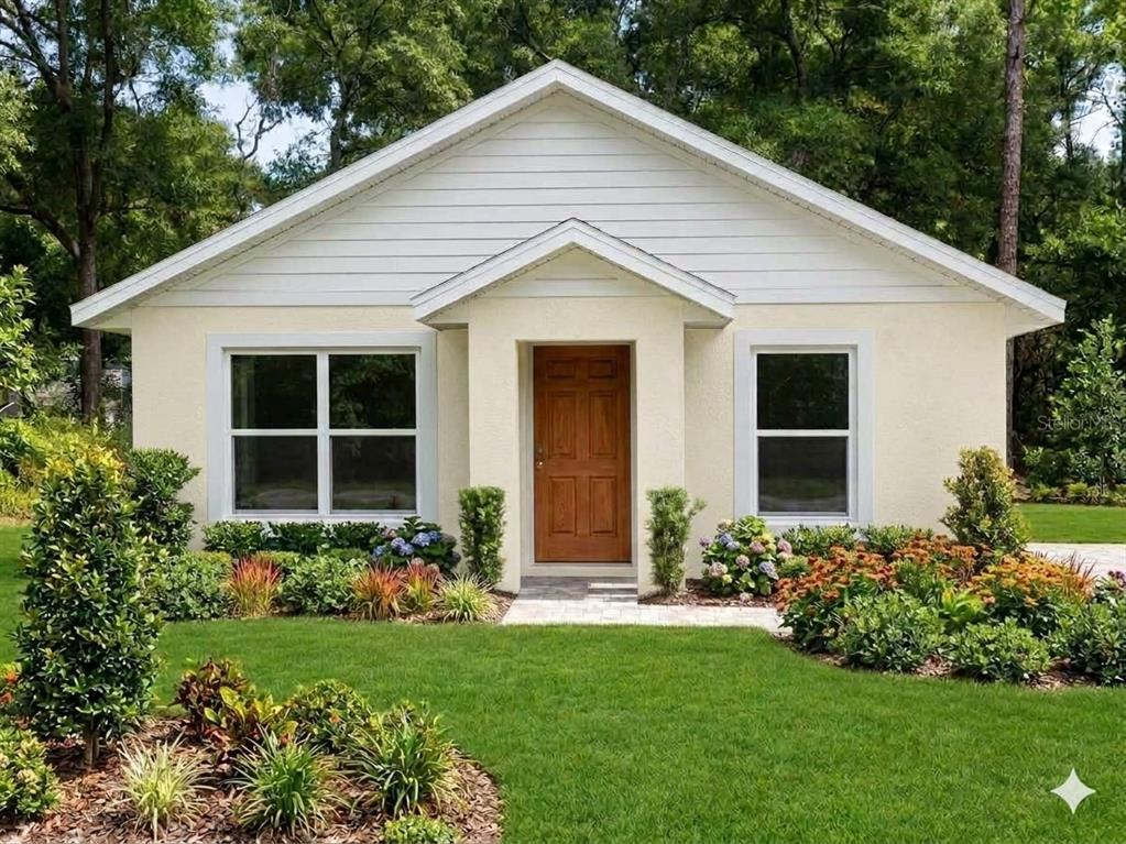 a view of a house with garden and yard