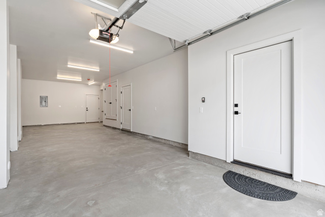 32 West 400 South Bountiful, UT 84010 - Photo 30 of 31 Garage featuring electric panel and a garage door opener