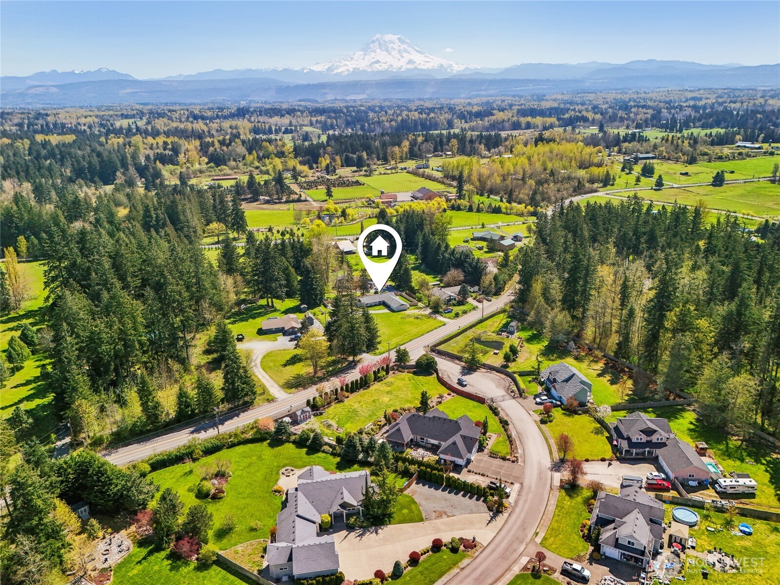 27713 Webster Road East Graham, WA 98338 - Photo 2 of 39 an aerial view of residential houses with outdoor space
