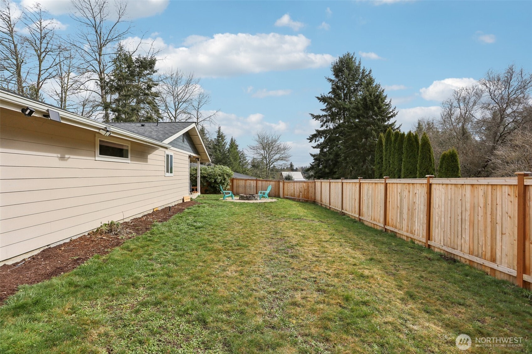 27713 Webster Road East Graham, WA 98338 - Photo 38 of 39 a view of backyard with green space