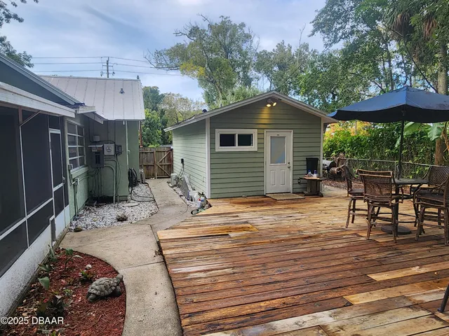 a view of a chairs and tables in the patio