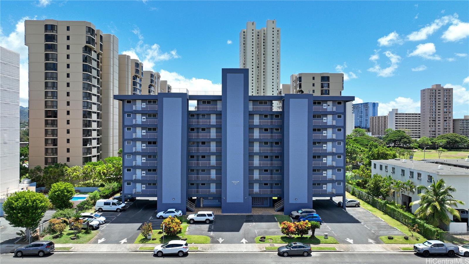 955 Ala Lilikoi Street, Unit 502 Honolulu, HI 96818 - Photo 7 of 21 a view of a building and a garden