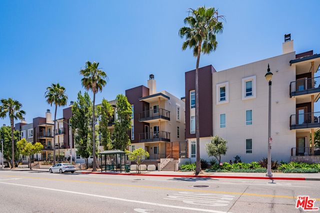 a cars parked in front of a building