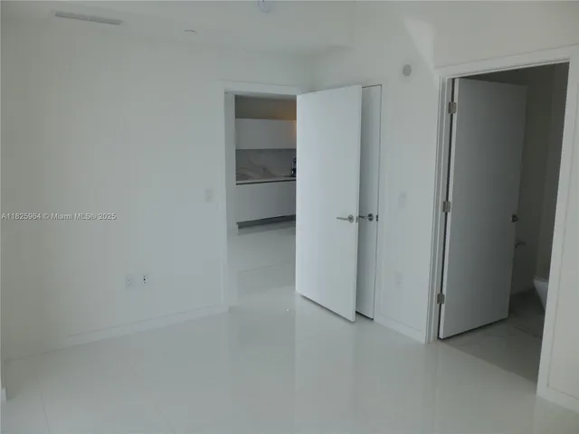 an empty room with closet