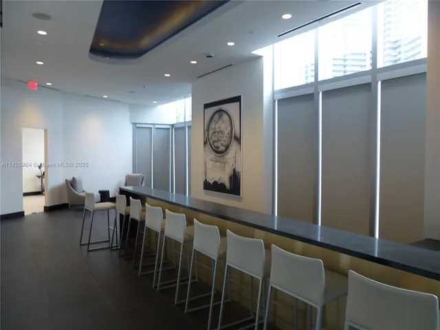 a view of swimming pool from a balcony