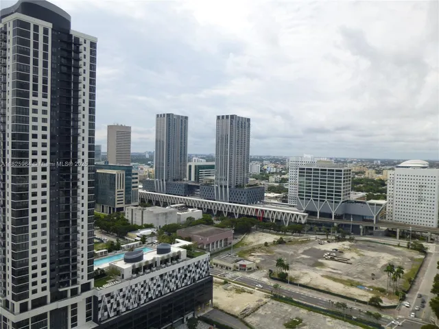 a view of a city with tall buildings