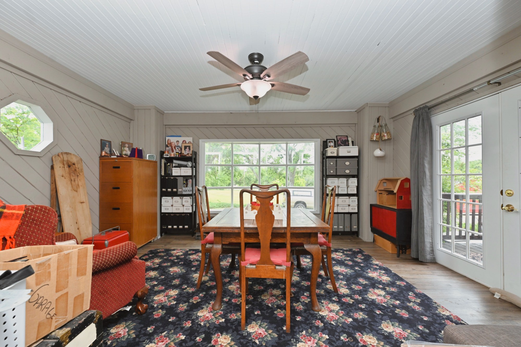 655 East Main Street Gallatin, TN 37066 - Photo 14 of 84 a living room with furniture a bookshelf and a large window