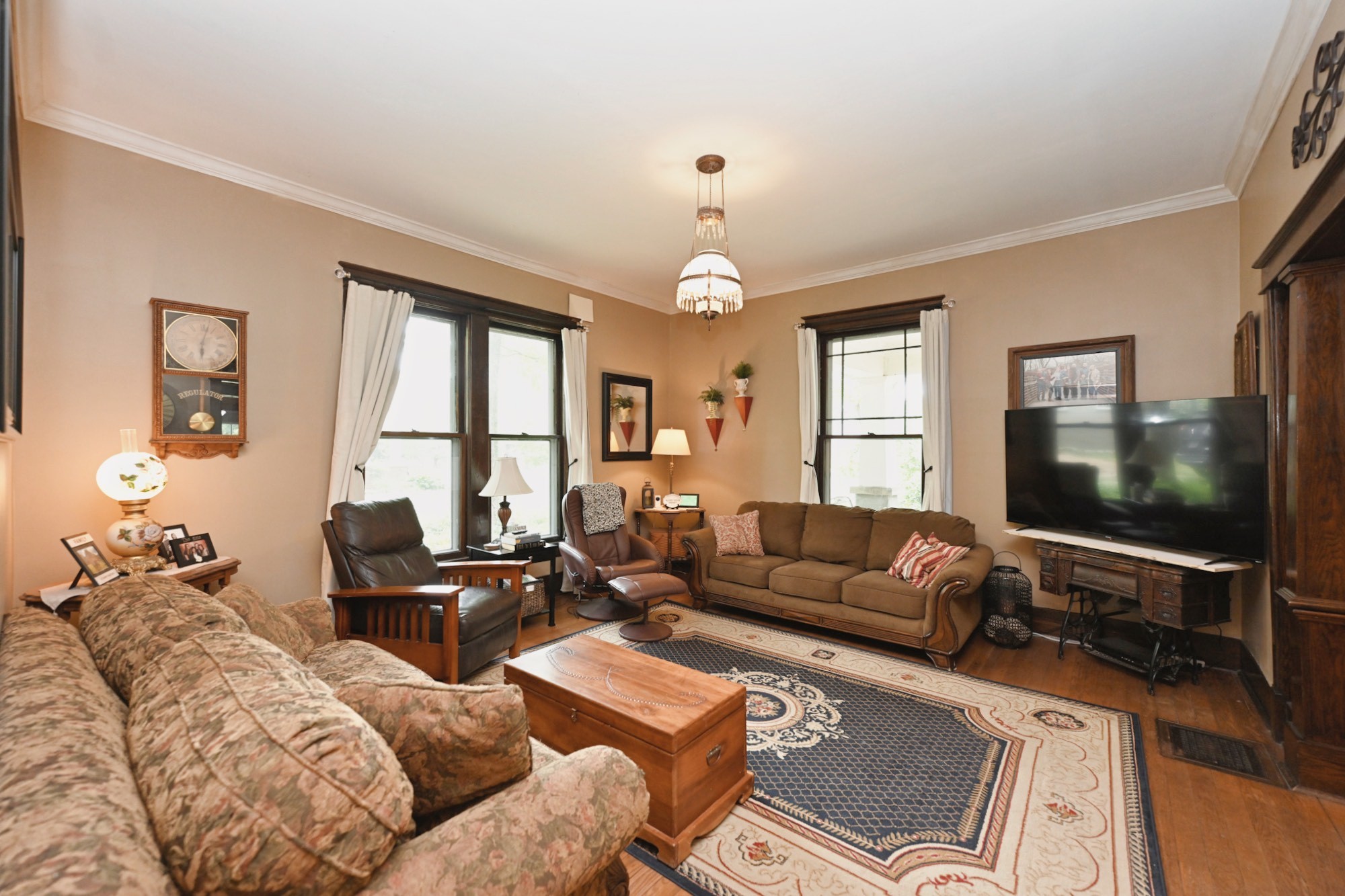 655 East Main Street Gallatin, TN 37066 - Photo 16 of 84 a living room with furniture a large window and a flat screen tv