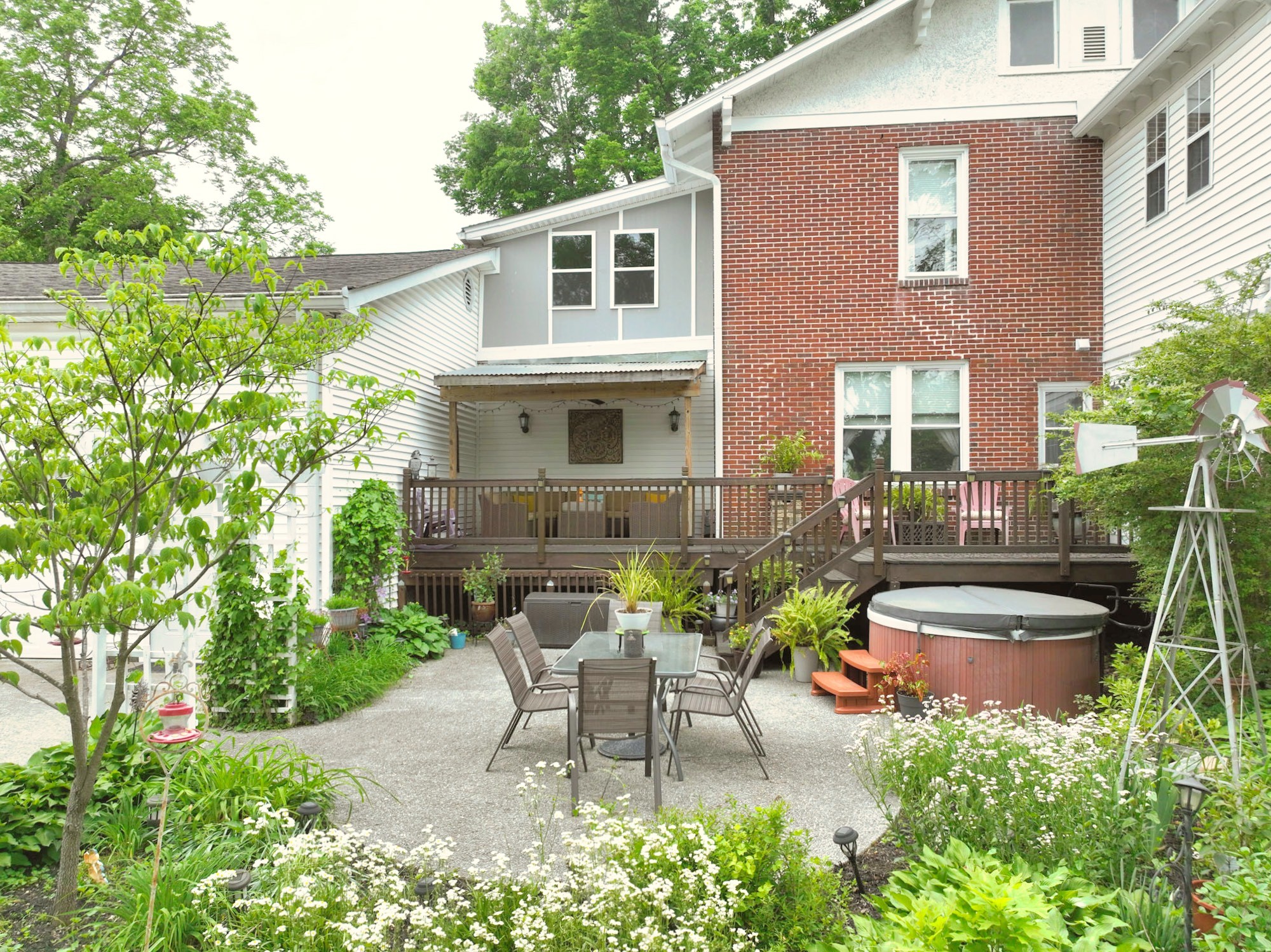 655 East Main Street Gallatin, TN 37066 - Photo 73 of 84 a view of a patio with table and chairs and potted plants