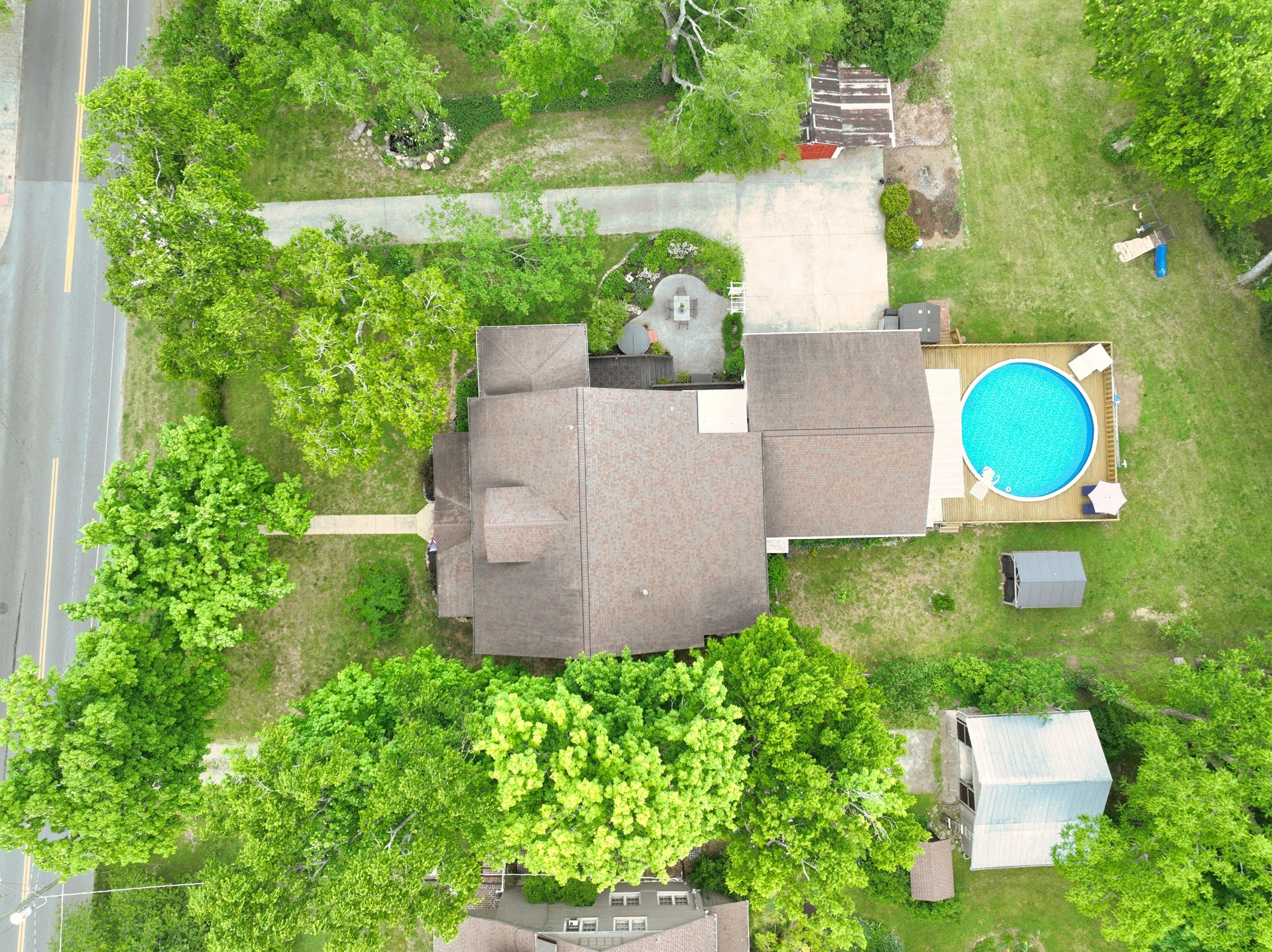 655 East Main Street Gallatin, TN 37066 - Photo 76 of 84 an aerial view of a house with a backyard and trees