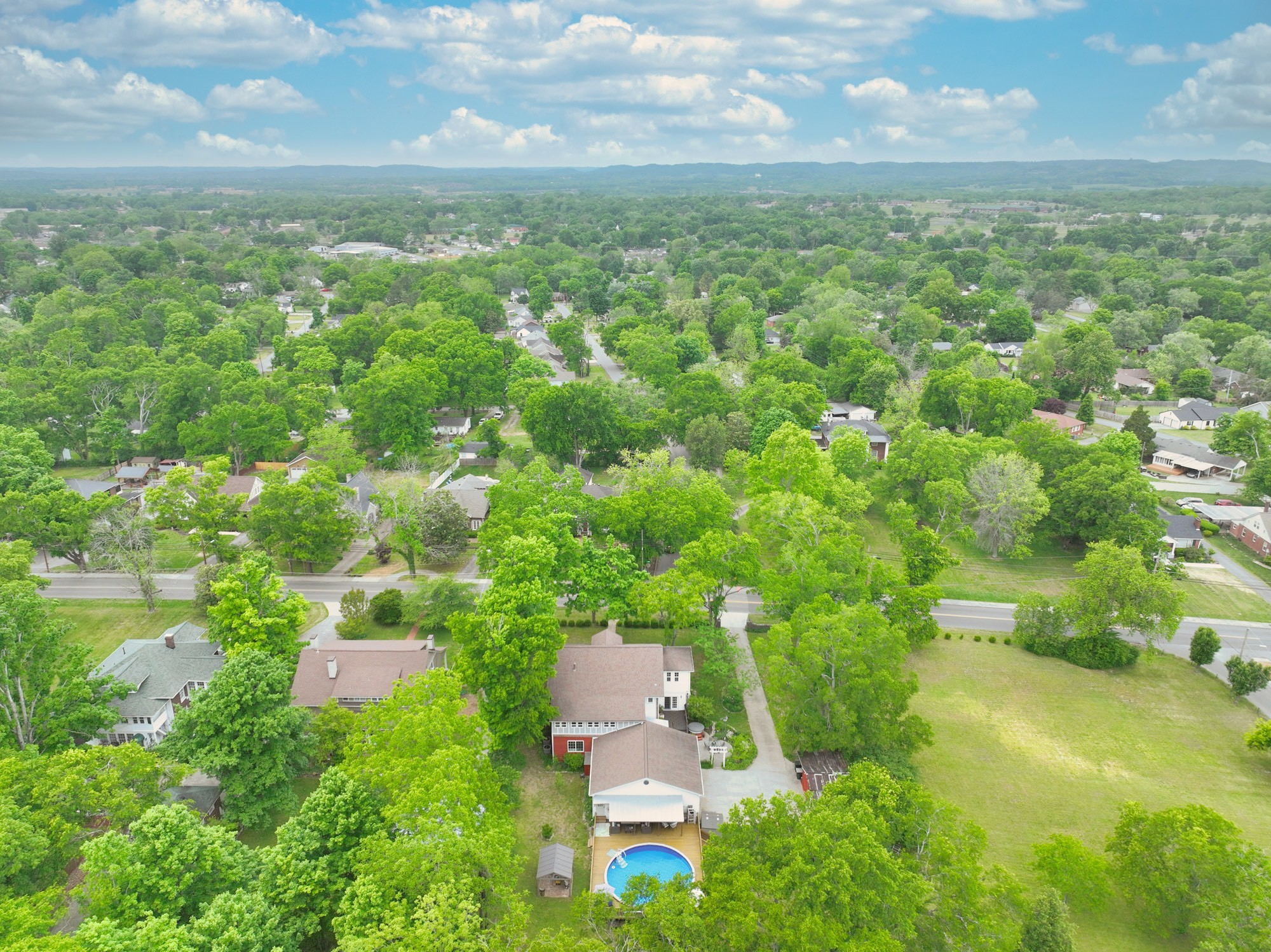 655 East Main Street Gallatin, TN 37066 - Photo 77 of 84 an aerial view of residential houses with outdoor space and trees