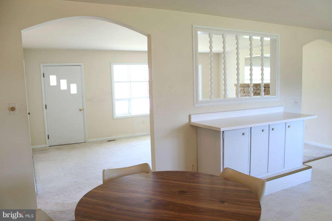3055 Riverview Drive Riva, MD 21140 - Photo 17 of 30 a view of an empty room with window and wooden floor
