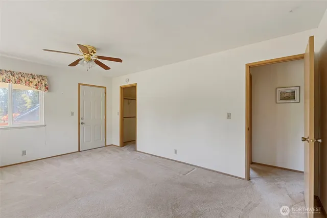 a view of empty room with windows