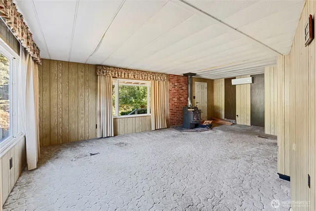 an empty room with windows