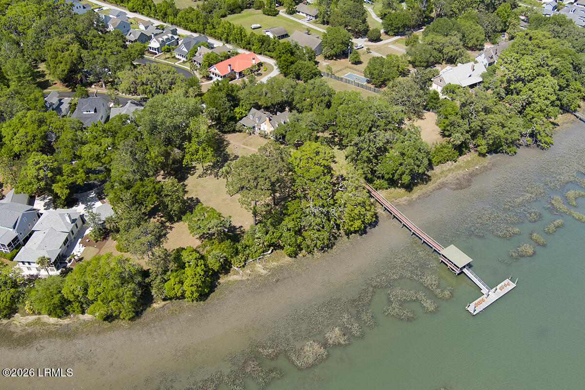 98 Gautier Place Beaufort, SC 29902 - Photo 22 of 24 High drone view of neighborhood and dock